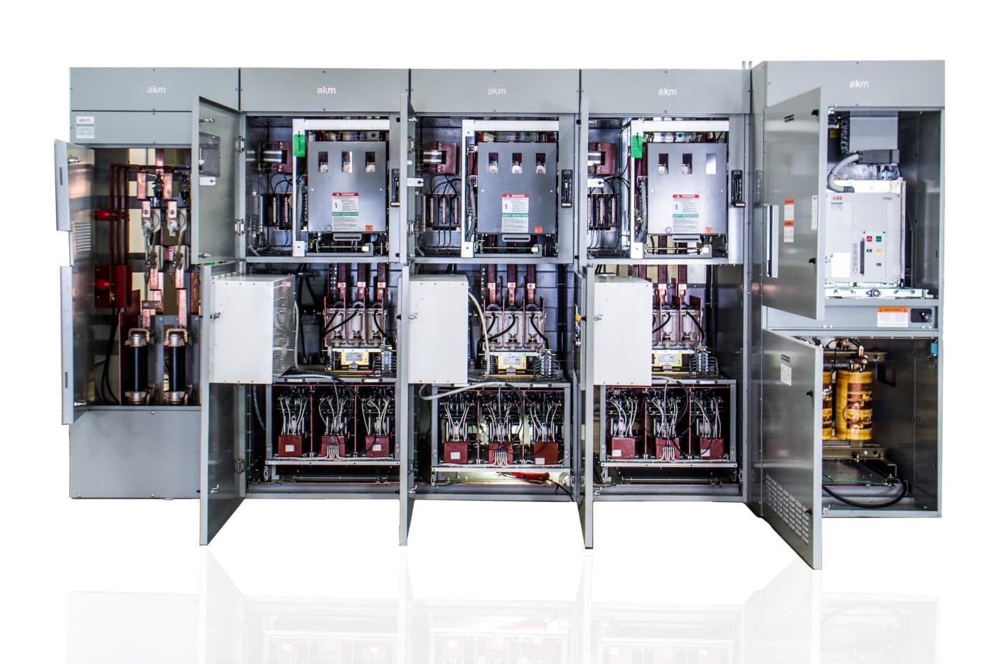 AKM electrical equipment with open cabinets showing the assembled components and wiring