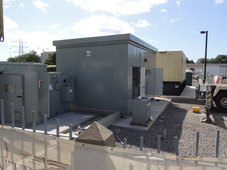 Med Centro e-house with generator equipment alongside it